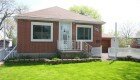 What will be our Dreamhouse, pre-renovation. Front exterior view of our 1960s bungalow.