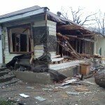 The house coming down - mid demolition