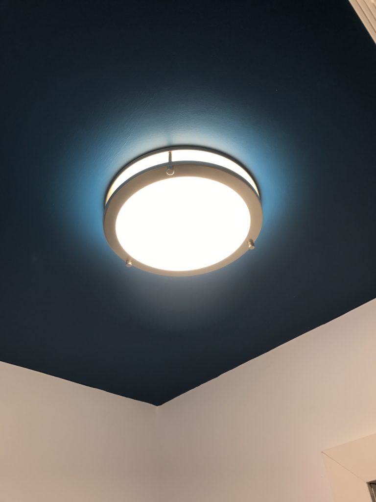 After: LED Flush mount fixture installed in our powder room