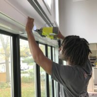 Kes installing our Metrie window moulding