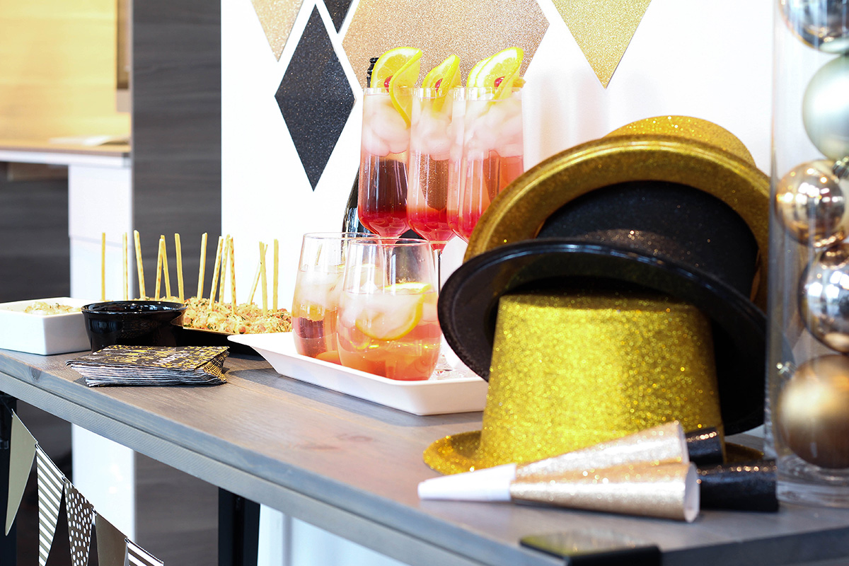 NYE black and gold decor with party favours
