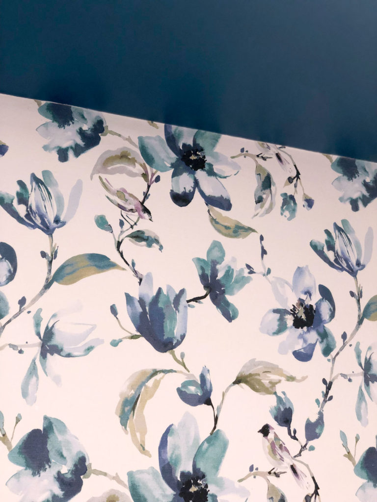DIY Fabric Wallpaper using the beautiful Layla fabric in indigo from Tonic Living creates a perfect accent against the painted ceiling in the powder room