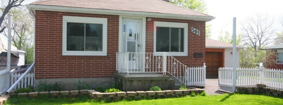 What will be our Dreamhouse, pre-renovation. Front exterior view of our 1960s bungalow.